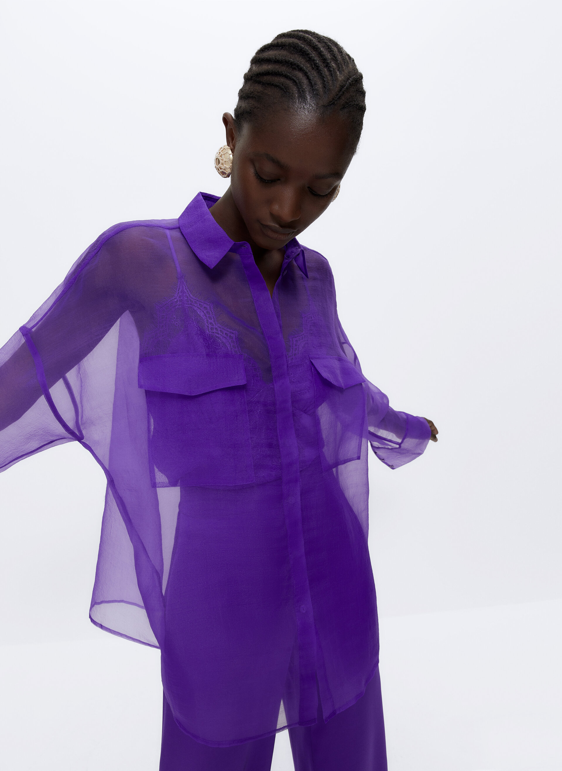 Uterque purple organza shirt in an oversized fit with double chest pockets and hidden button placket. 