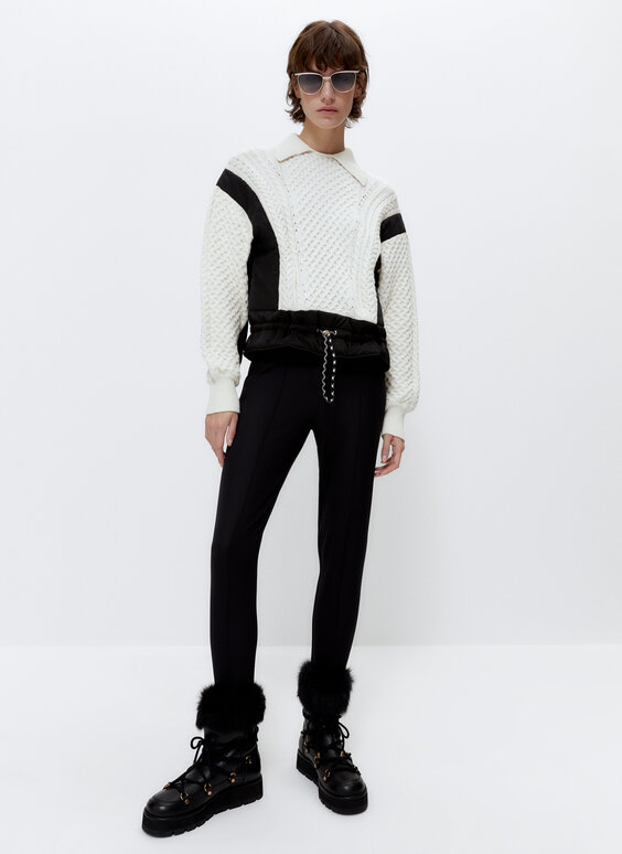 Cable-knit sweater with nylon appliqués