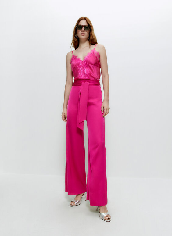 Flowing trousers with tie detail