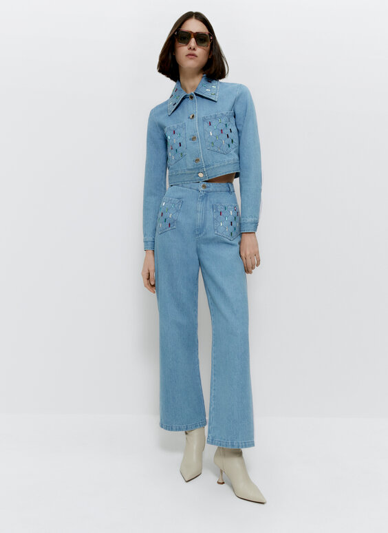 denim jacket on jumpsuit